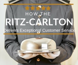 Waiter with silver platter The Ritz-Carlton